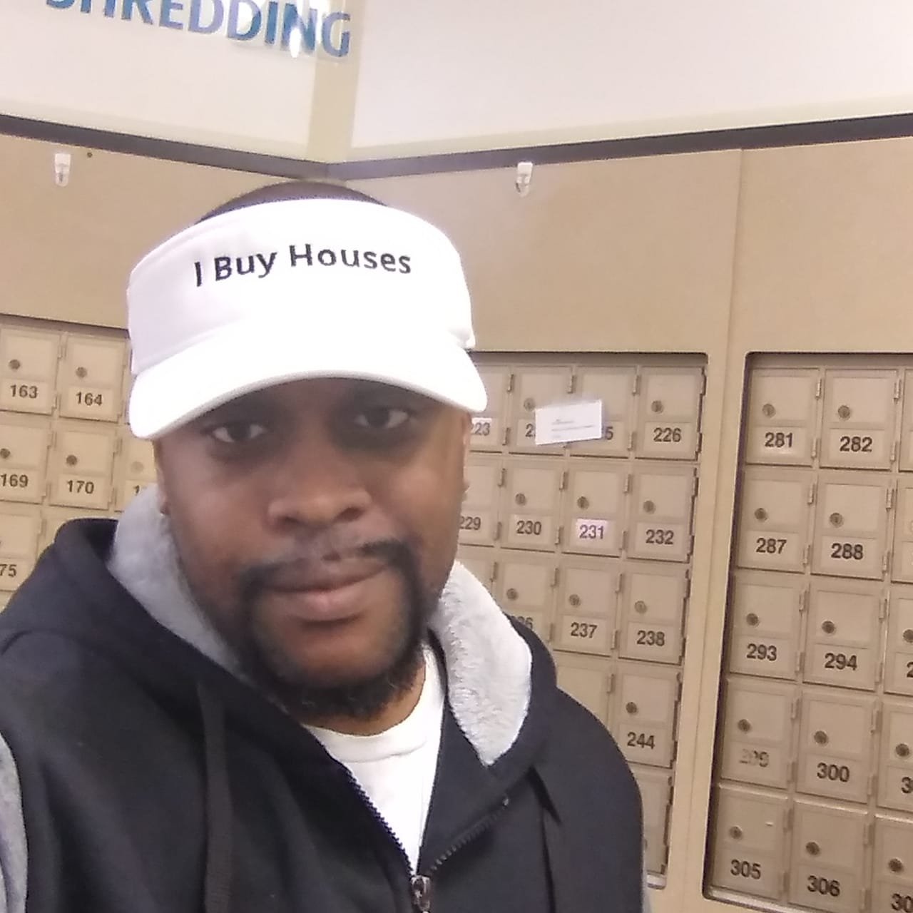 Chris Monroe prospecting for real estate opportunities at neighborhood mailboxes