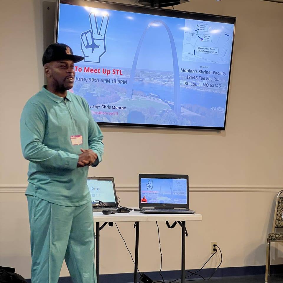 Chris Monroe teaching at a St. Louis real estate meetup